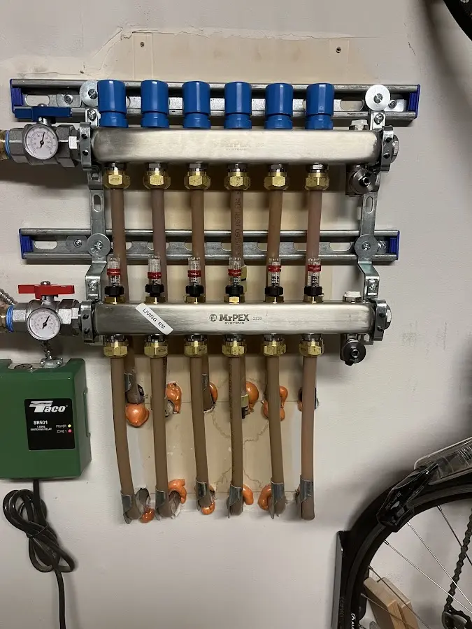 Plumber performing Gas Line Installation at a residential property in Burlington